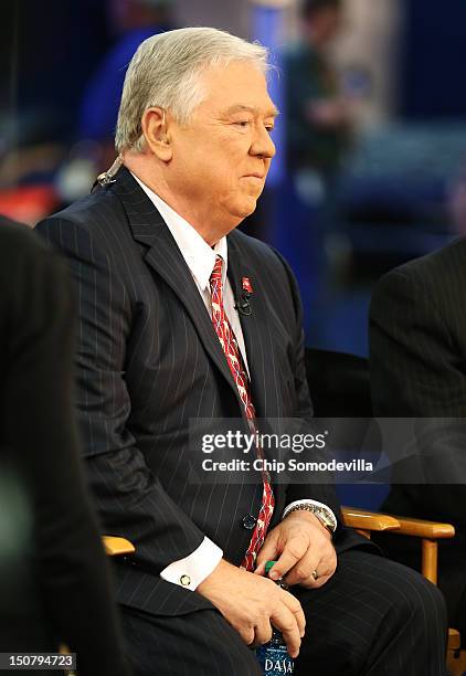 Former Mississippi Gov. Haley Barbour prepares to give an interview ahead of the Republican National Convention at the Tampa Bay Times Forum on...