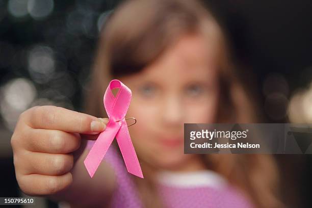 pink ribbon - childhood cancer stock pictures, royalty-free photos & images