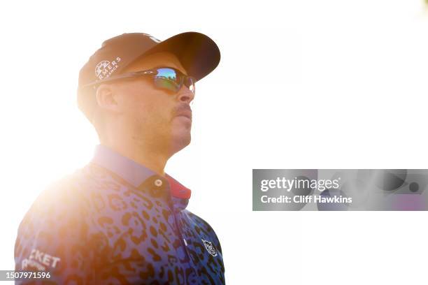 Rickie Fowler of the United States walks from the 18th tee during the third round of the Rocket Mortgage Classic at Detroit Golf Club on July 01,...