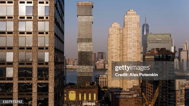 jersey city downtown with the view of freedom tower in lower manhattan. - jersey city stock pictures, royalty-free photos & images