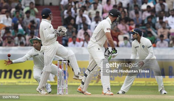 Indian player Virender Sehwag takes an easy catch off the bowling of Ravichandran Ashwin during the fourth day of the first Test match between India...