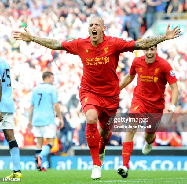 Martin Skrtel of Liverpool celebrates his goal during the Barclays Premier League match between Liverpool and Manchester City at Anfield on August...