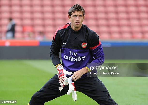 Damian Martinez of Arsenal warms up before the Barclays Premier League match between Stoke City and Arsenal at Britannia Stadium on August 26, 2012...