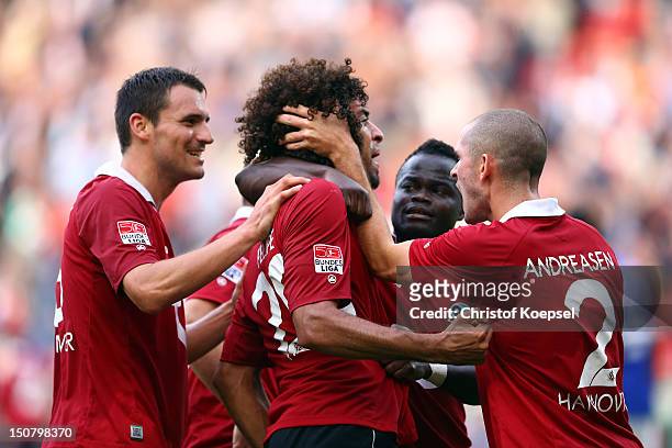 Felipe celebrates the first goal with Mario Eggimann , Didier Ya Konan and Leon Andreasen of Hannover during the Bundesliga match between Hannover 96...