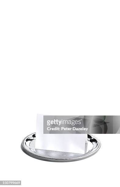 a blank card on a silver serving tray, on white - silver platter stock pictures, royalty-free photos & images