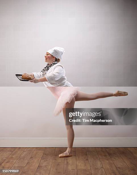 female baker top, ballet dancer bottom - body part foto e immagini stock