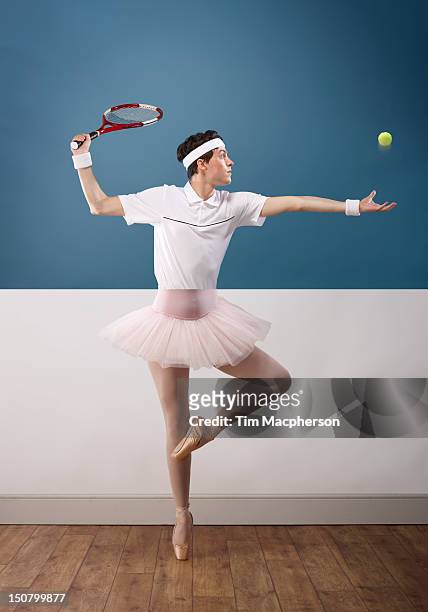 tennis player top, ballet dancer bottom - sport blue background stock-fotos und bilder