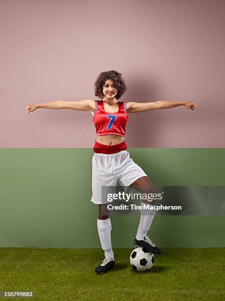 cheer leader top, footballer bottom - fantasy football stock pictures, royalty-free photos & images