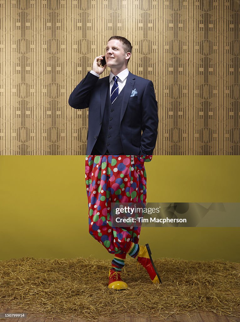 Business man top, clown bottom
