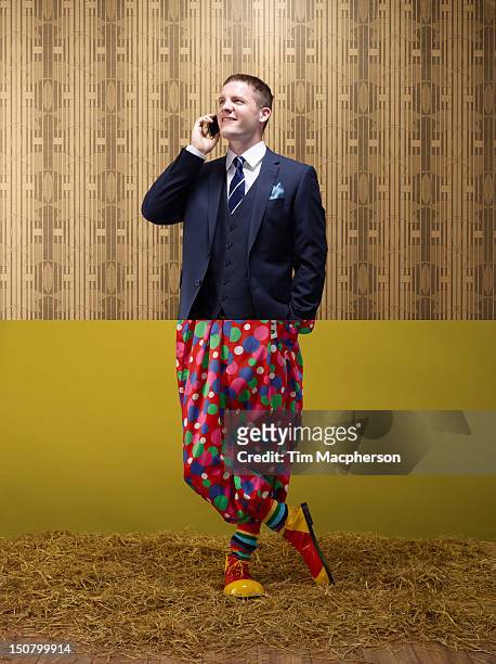 business man top, clown bottom - cheerleader stock pictures, royalty-free photos & images