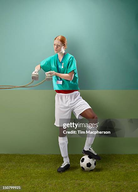 surgeon top, footballer bottom - crazy doctor stock pictures, royalty-free photos & images