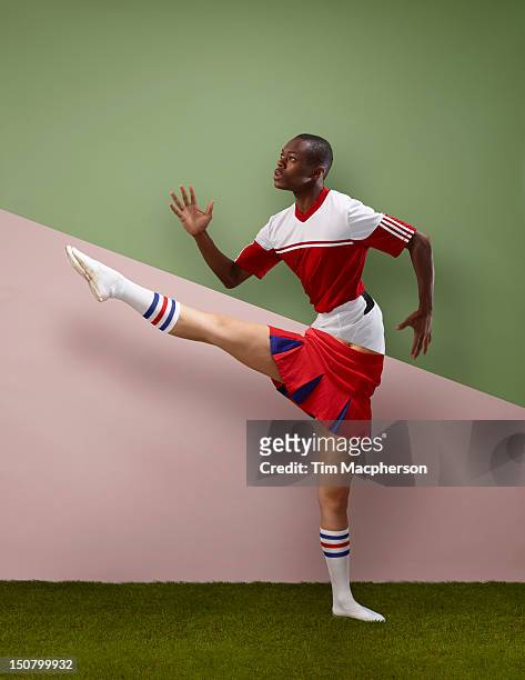 footballer top, cheer leader bottom - sports imagery 2012 fotografías e imágenes de stock