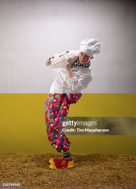 female baker top, clown bottom - funny clown stockfoto's en -beelden