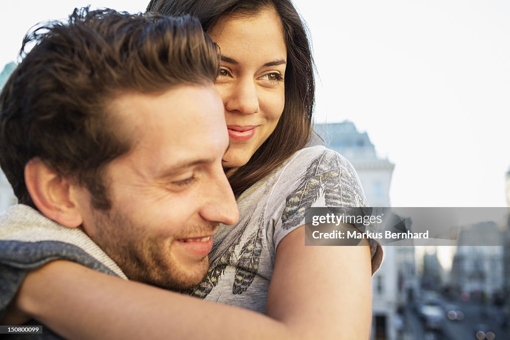 Urban Couple embracing.