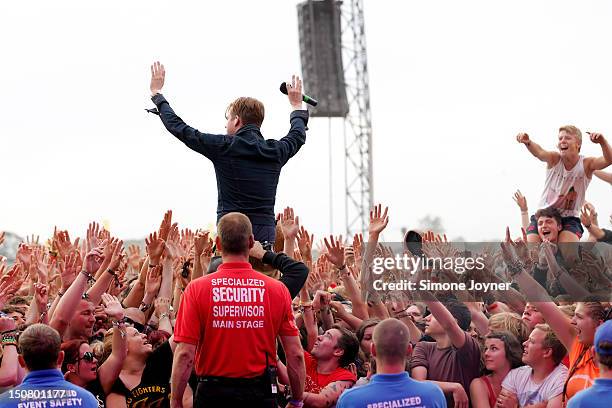 Ricky Wilson of the Kaiser Chiefs performs live on the Main Stage on Day Three during the Reading Festival 2012 at Richfield Avenue on August 26,...