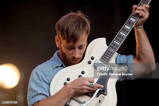 Dan Auerbach of The Black Keys performs live on the Main Stage on Day Three during the Reading Festival 2012 at Richfield Avenue on August 26, 2012...