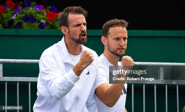 Coach Christopher Kas cheers on Jule Niemeier of Germany during her first round match during Day Four of The Championships Wimbledon 2023 at All...