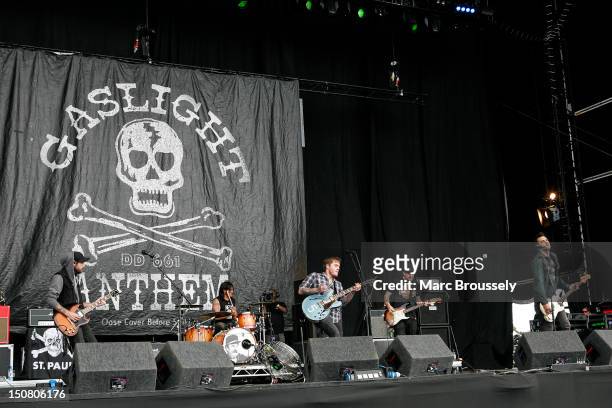 Alex Rosamilia, Benny Horowitz, Brian Fallon, Ian Perkins and Alex Levine of The Gaslight Anthem perform on the main stage during Day 3 of Reading...