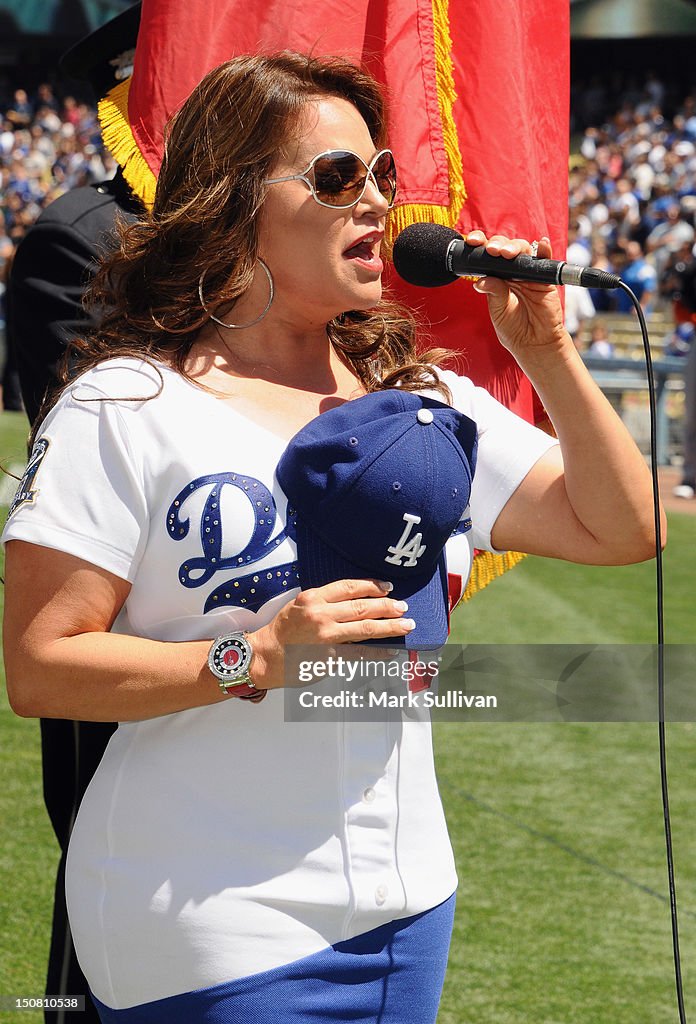 Mexican-American Banda And Nortena Star Jenni Rivera Sings The National Anthem At Dodger Stadium