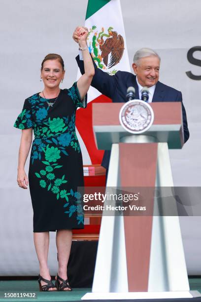 Beatriz Gutiérrez Müller and President of Mexico Andres Manuel Lopez Obrador acknowledge supporters during the 5th year celebration of the victory in...