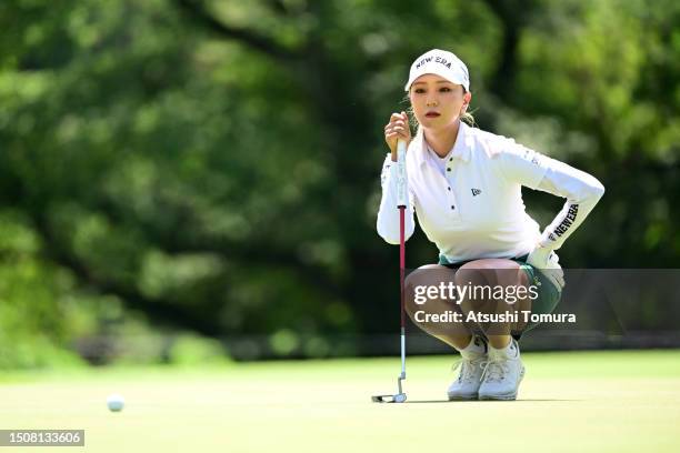 Naruha Miyata of Japan lines up a putt on the 1st green during the final round of SHISEIDO Ladies Open at Totsuka Country Club on July 2, 2023 in...