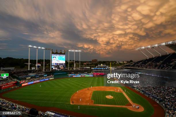 General view of the sky lighting up as the Kansas City Royals take on the Los Angeles Dodgers during the second inning at Kauffman Stadium on July...