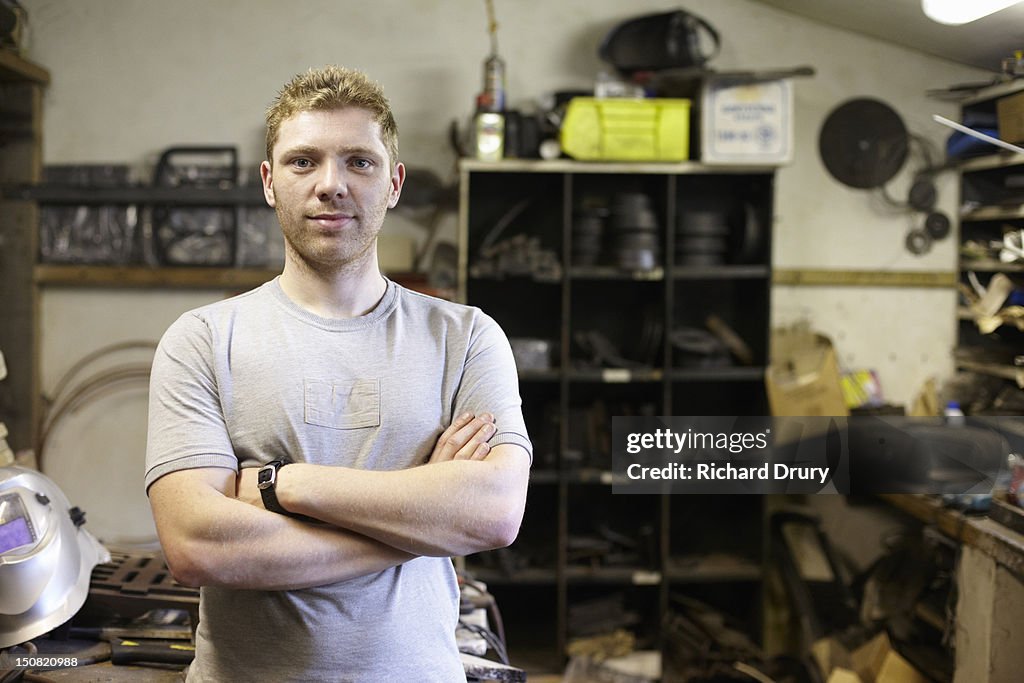 Welder in his workshop