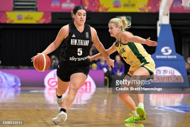 Charlisse Leger-Walker of New Zealand is challenged by Shyla Heal of Australia during the 3rd place 2023 FIBA Women's Asia Cup match between...