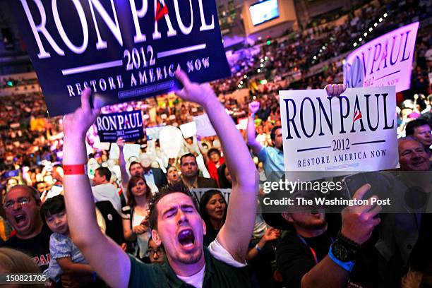 Adam Bace screams out his support for Ron Paul at an event at the University of South Florida in Tampa Florida's Sun Dome on Sunday August 26, 2012.