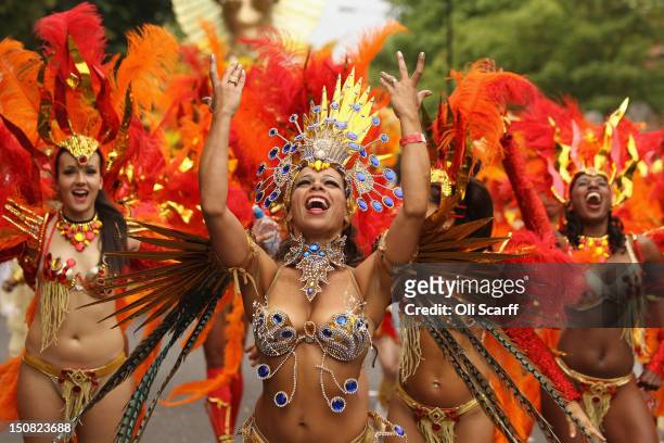 Revellers perform at the Notting Hill Carnival on August 27, 2012 in London, England. The annual 2-day carnival, which is the largest of its kind in...