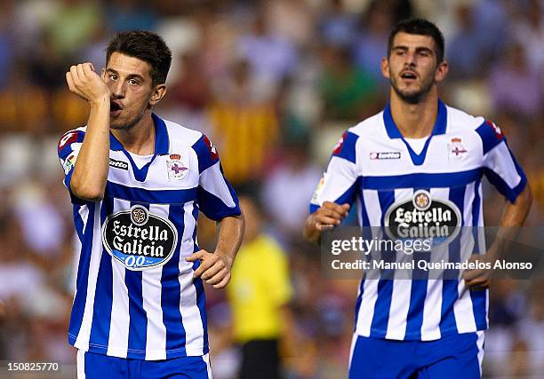 Pizzi of Deportivo celebrates after scoring the third goal during the La Liga match between Valencia and Deportivo at Estadio Mestalla on August 26,...