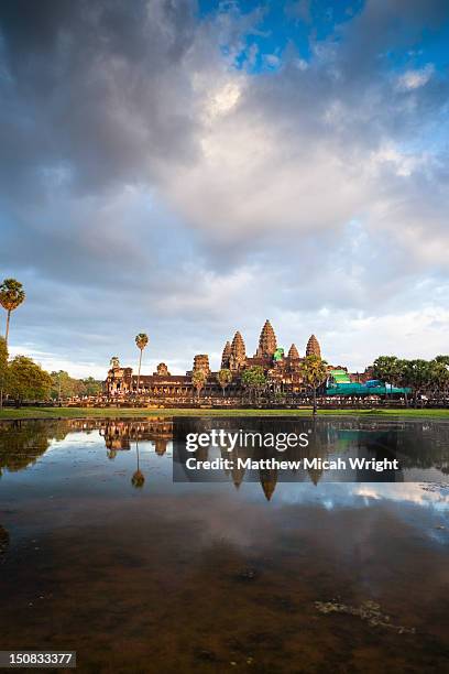 the angkor wat temple at sunset. - angkor wat foto e immagini stock