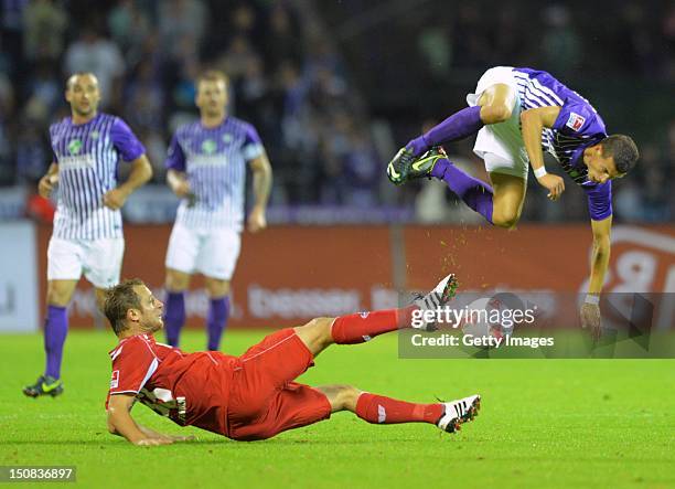 Matthias Lehmann of Cologne challenges Andreas Wiegel of Aue during the Second Bundesliga match between Erzgebirge Aue and 1. FC Koeln at Erzgebirgs...