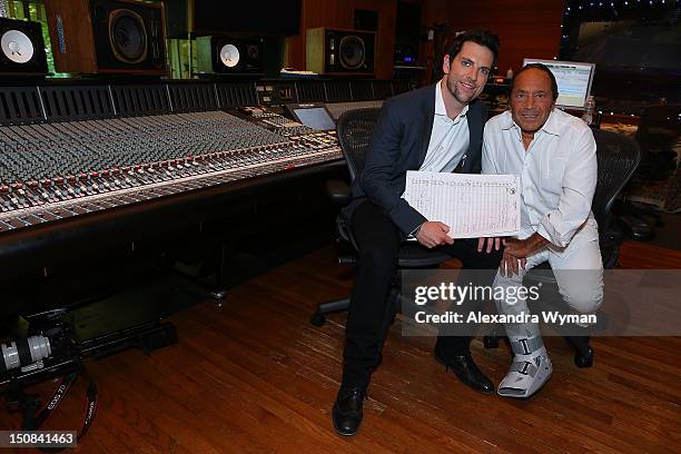 The Voice's Chris Mann and Legendary Crooner Paul Anka at a Photo Call held at Conway Recording Studios on August 27, 2012 in Los Angeles, California.