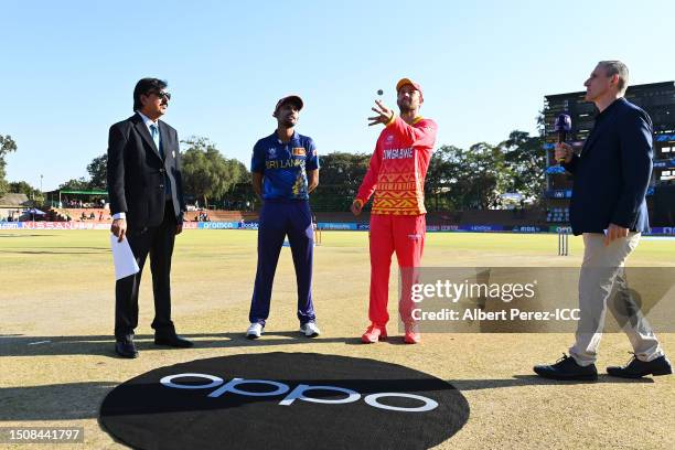 Dasun Shanaka of Sri Lanka and Craig Ervine of Zimbabwe take part in the coin toss prior to the ICC Men's Cricket World Cup Qualifier Zimbabwe 2023...