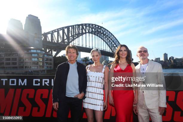 Tom Cruise, Pom Klementieff, Hayley Atwell and Simon Pegg attend a photo call in support of "Mission: Impossible - Dead Reckoning Part One" at...