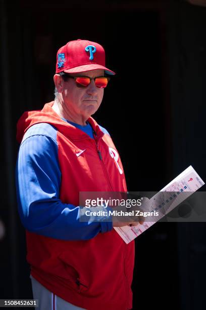 Manager Rob Thomson of the Philadelphia Phillies in the dugout during the game against the Oakland Athletics at RingCentral Coliseum on June 18, 2023...