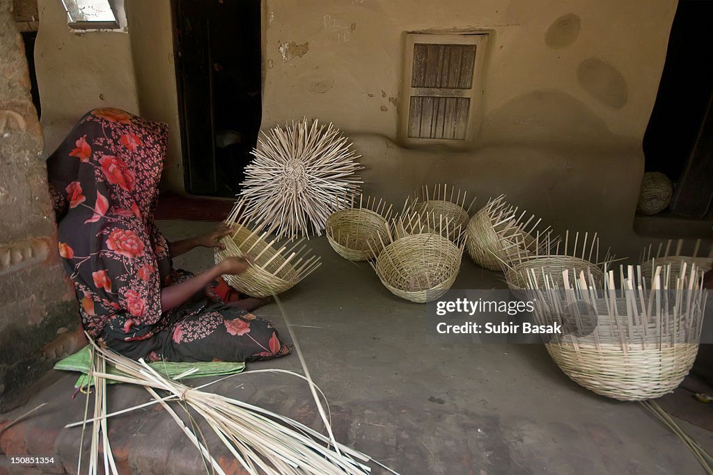 Woman making baskets