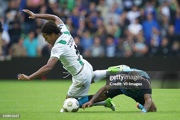 Virgil van dijk of FC Groningen,Jeremain Lens of PSV during the Dutch Eredivisie match between FC Groningen and PSV Eindhoven at the Euroborg stadium...