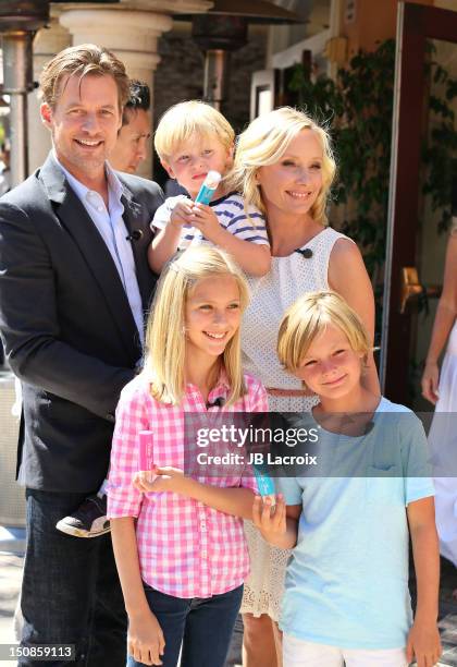 James Tupper, Atlas Heche Tupper, Anne Heche and Homer Laffoon are seen at The Grove on August 27, 2012 in Los Angeles, California.