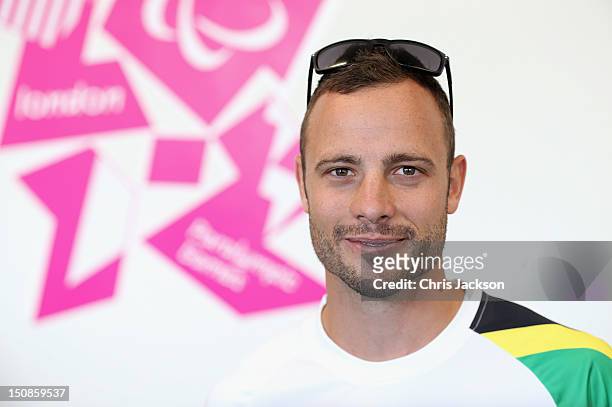 Paralympic athlete Oscar Pistorius of South Africa smiles during a press conference ahead of the London 2012 Paralympic Games on August 28, 2012 in...