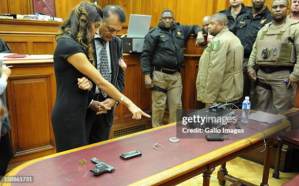 Murdered honeymooner Anni Dewani's father, Vinod Hindocha with Anni's niece in the Western Cape High Court, where suspect Xolile Mngeni appears in...