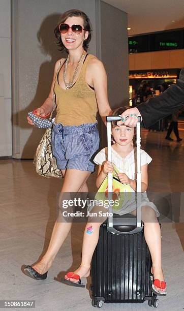 Actress Milla Jovovich and daughter Ever Anderson arrive at Narita International Airport on August 28, 2012 in Narita, Japan.
