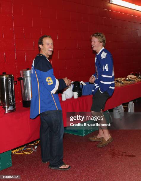 Jaden Schwartz of the St. Louis Blues and Morgan Rielly of the Toronto Maple Leafs share a laugh at the 2012 NHLPA rookie showcase at the MasterCard...