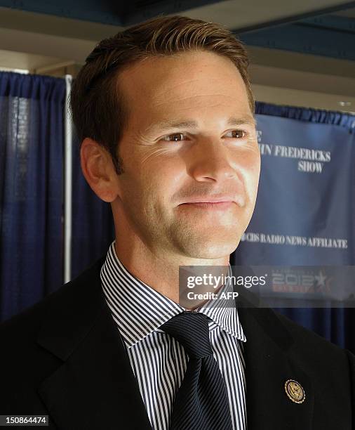 Republican Congressman Aaron Schock of Illinois smiles during an interview with AFP at the Convention Center in Tampa, Florida, on August 28, 2012...