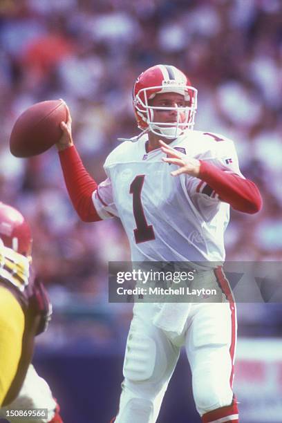 Jeff George of the Atlanta Falcons looks to throw a pass during a football game against the Washington Redskins on September 25, 1994 at RFK Stadium...