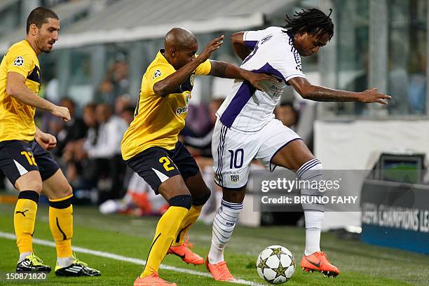 Limassol's Marco Airosa and Anderlecht's Kanu fight for the ball during the UEFA Champions League playoff match between Belgian RSC Anderlecht and...