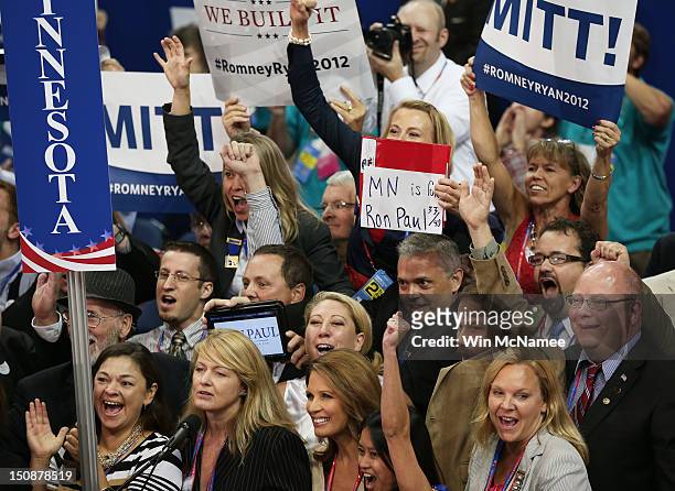 Supporters of U.S. Rep. Ron Paul from Minnesota cheer during the Republican National Convention at the Tampa Bay Times Forum on August 28, 2012 in...