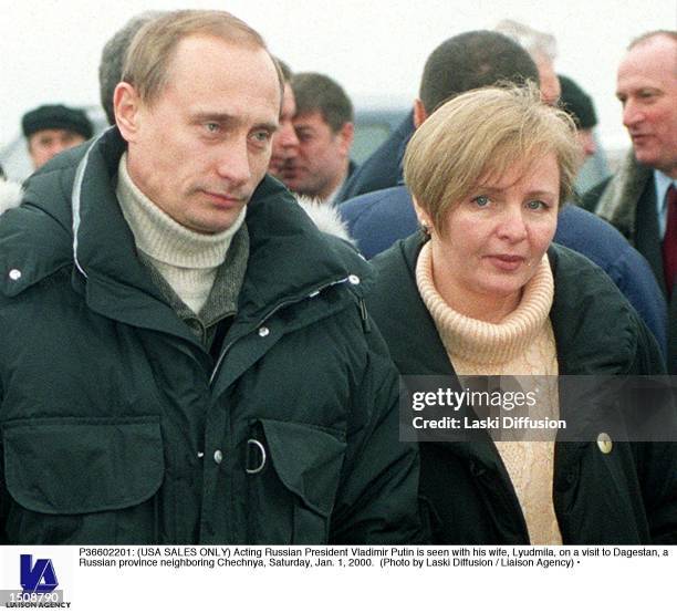 Acting Russian President Vladimir Putin is seen with his wife, Lyudmila, on a visit to Dagestan, a Russian province neighboring Chechnya, Saturday,...