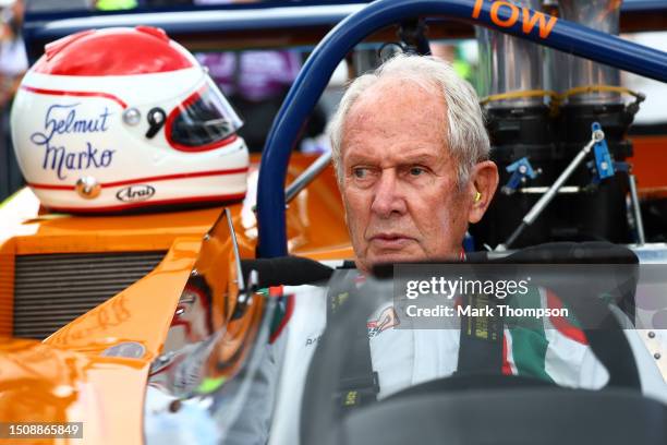 Red Bull Racing Team Consultant Dr Helmut Marko prepares to drive a BRM 157 in the Red Bull Legends Parade prior to the F1 Grand Prix of Austria at...